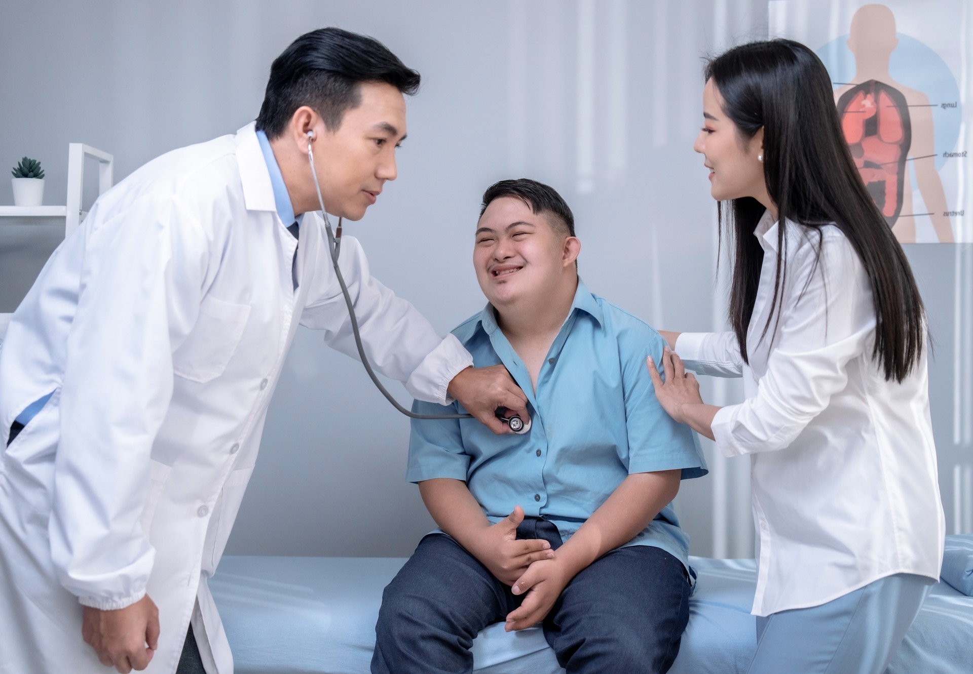 Asian mother and son coming for check-ups and consulting health problems with doctors.